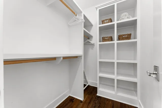 a bathroom with a double vanity sink and mirror