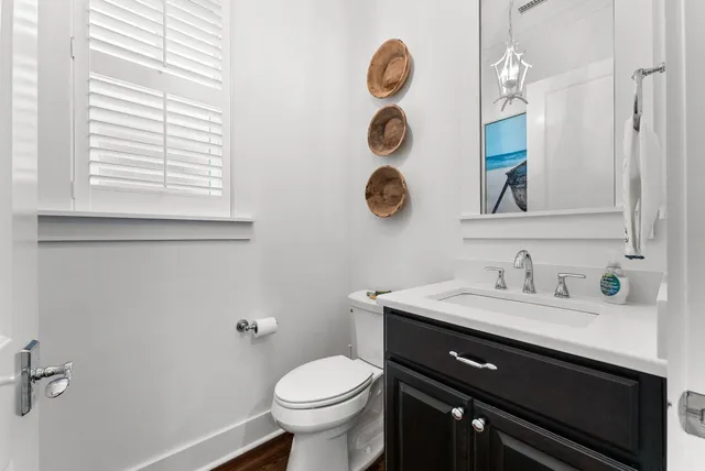 a bedroom with a bed and a television