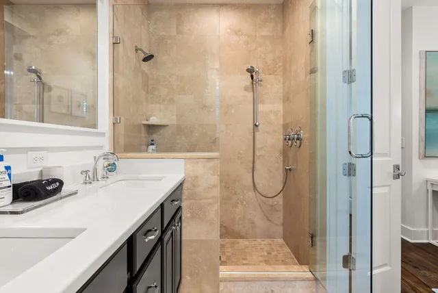 a view of a house with swimming pool and sitting area