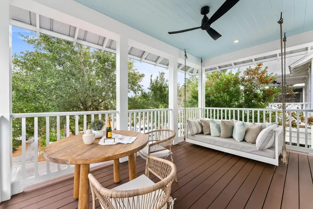 a view of a chairs and table in the patio