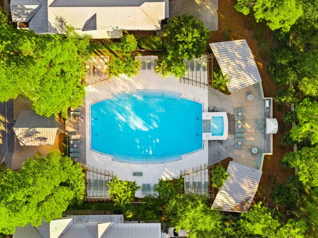 a view of a balcony with an outdoor seating