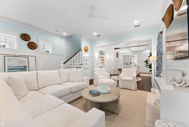 a view of a dining room with furniture wooden floor and chandelier