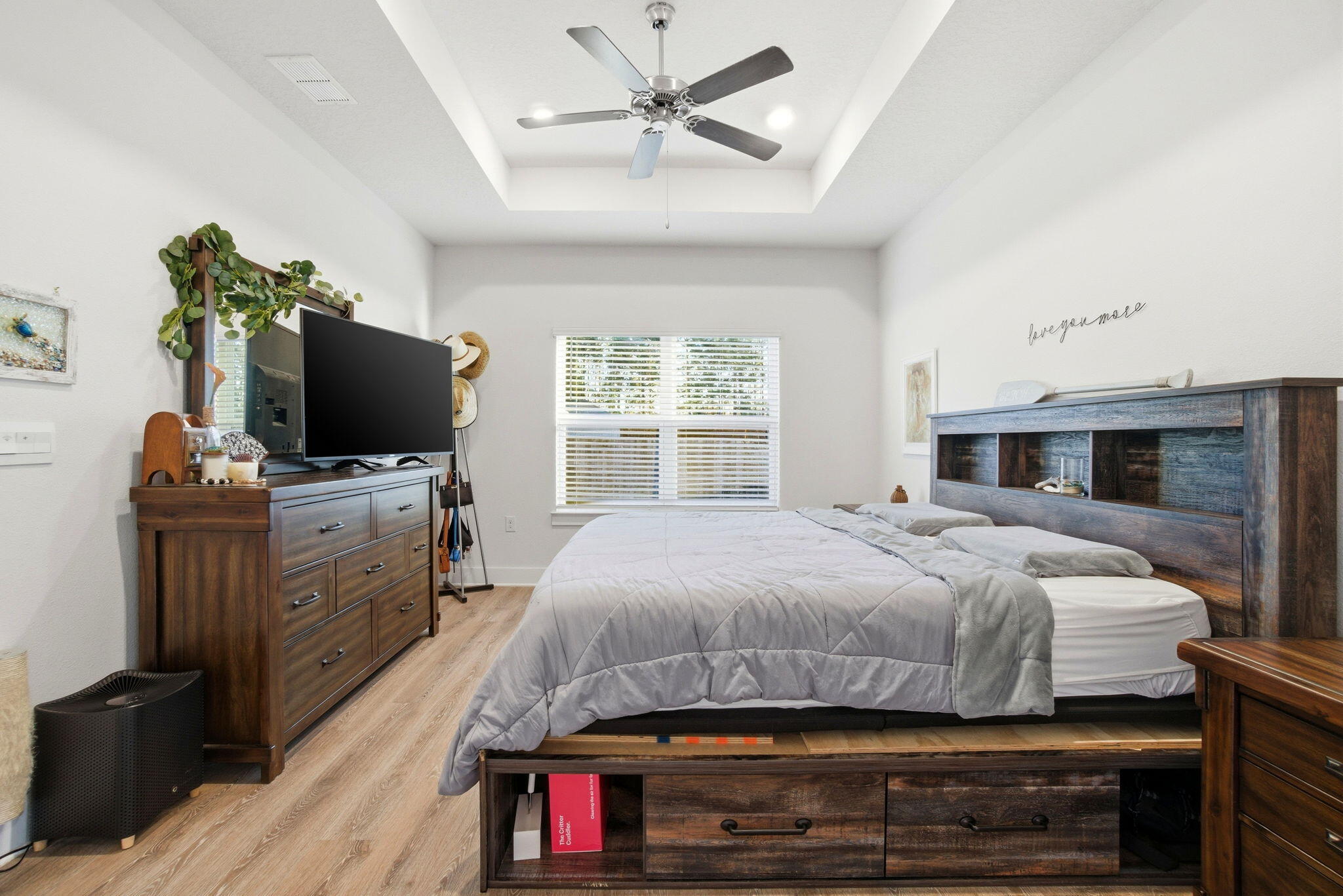 4067 Blaney Lane Pace, FL 32571 - Photo 19 of 40 a bedroom with a bed and a flat screen tv