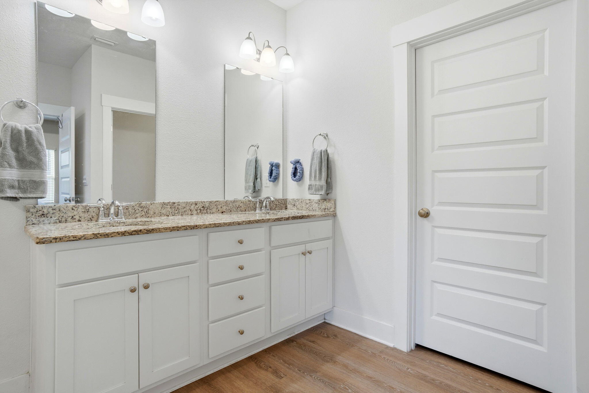 4067 Blaney Lane Pace, FL 32571 - Photo 22 of 40 a bathroom with a granite countertop sink and a mirror