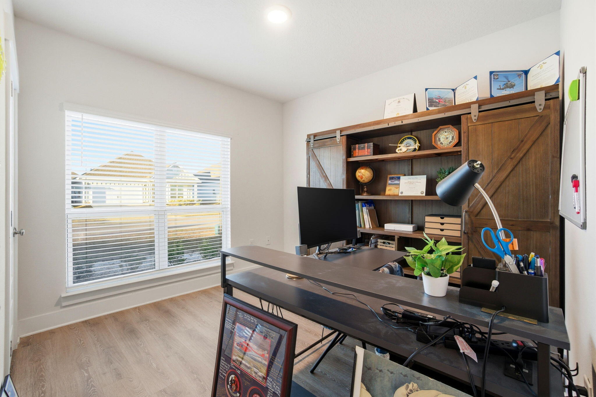 4067 Blaney Lane Pace, FL 32571 - Photo 24 of 40 a view of a workspace with furniture and a window