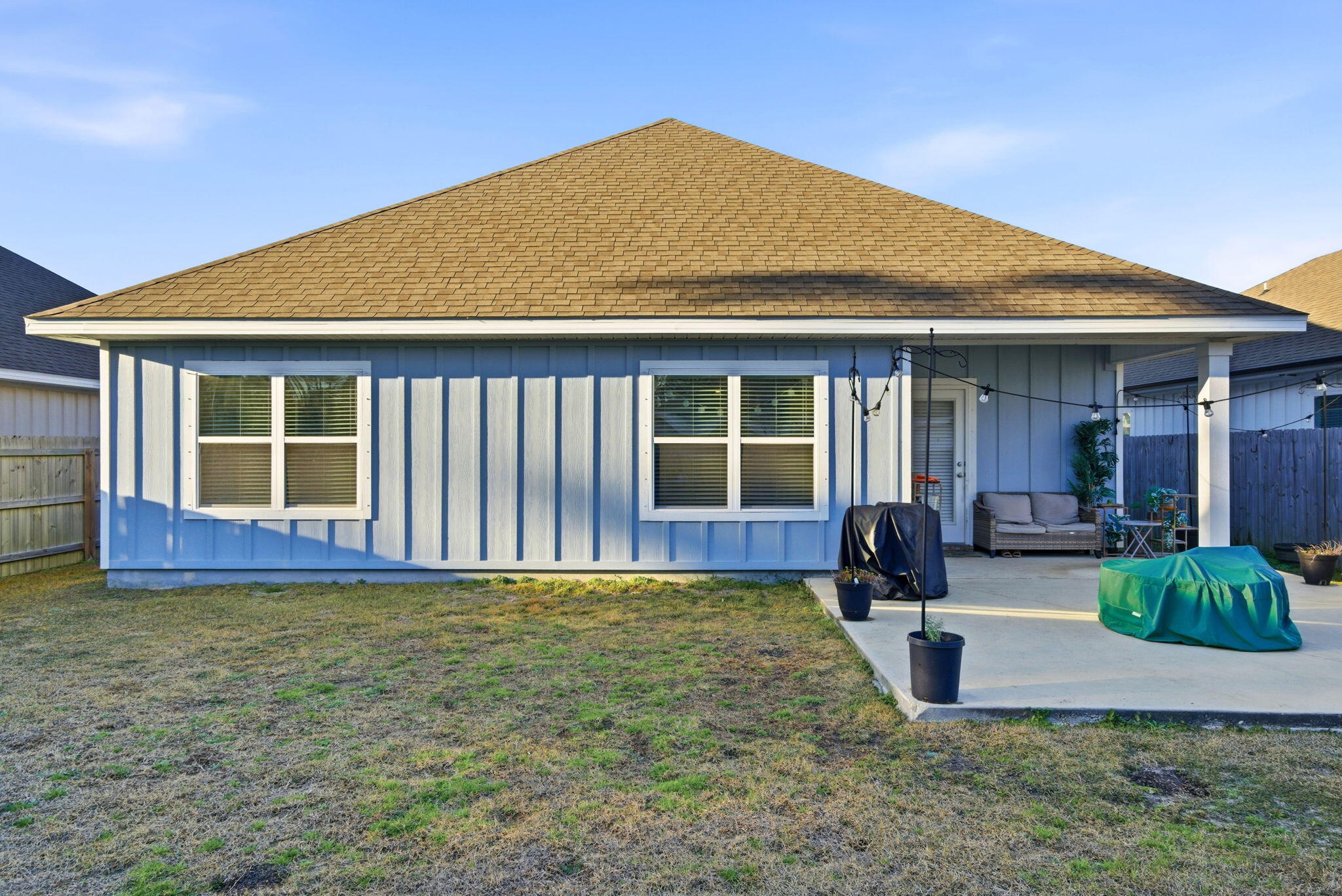 4067 Blaney Lane Pace, FL 32571 - Photo 37 of 40 a front view of house with yard and porch