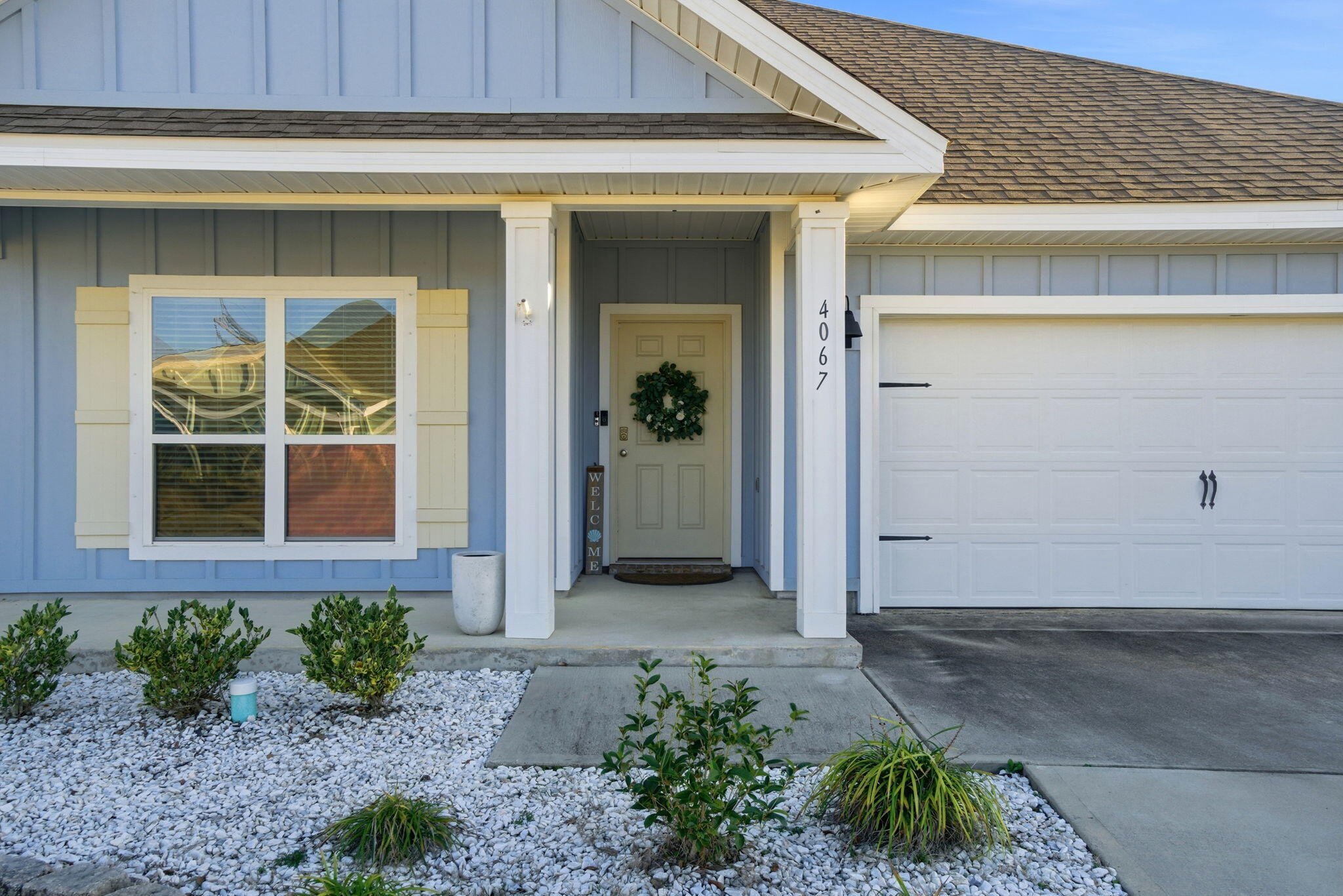 4067 Blaney Lane Pace, FL 32571 - Photo 4 of 40 a front view of a house with a yard