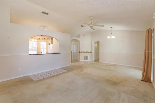 an empty room with a bathroom