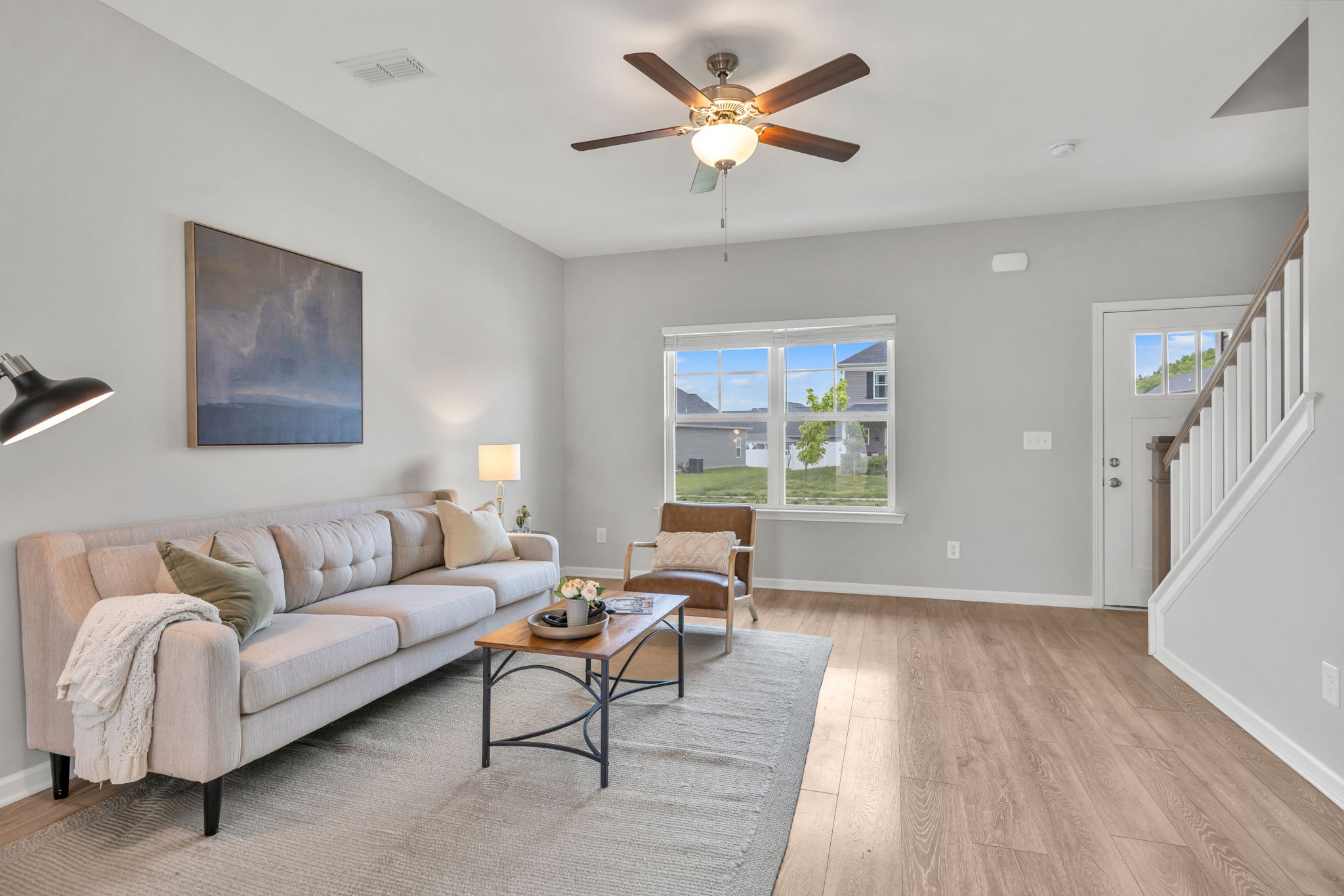 312 Turney Lane Spring Hill, TN 37174 - Photo 14 of 52 a living room with furniture and a wooden floor