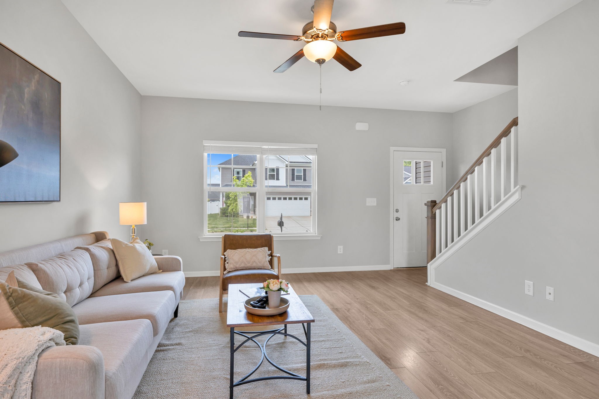 312 Turney Lane Spring Hill, TN 37174 - Photo 15 of 52 a living room with furniture and a wooden floor