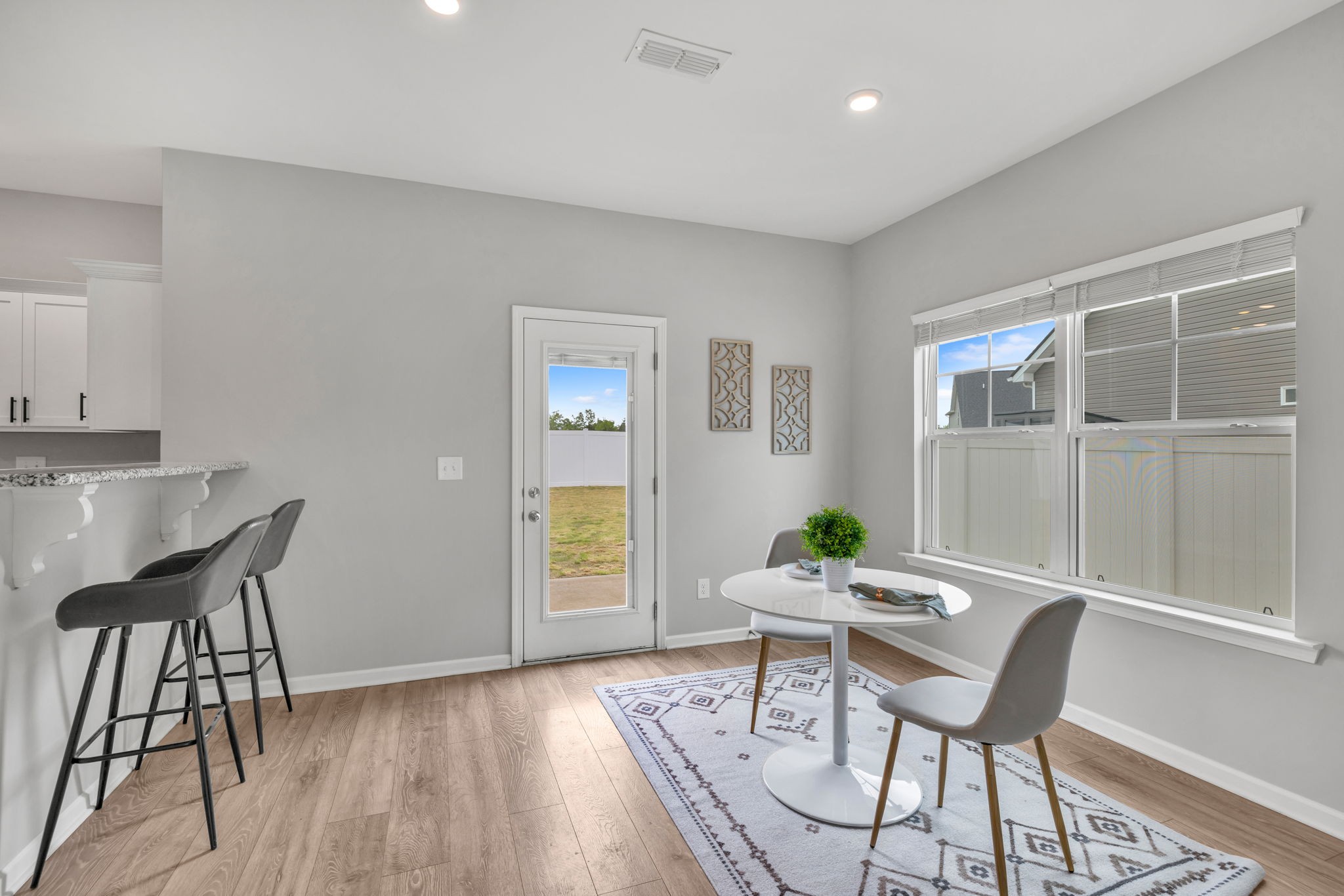 312 Turney Lane Spring Hill, TN 37174 - Photo 18 of 52 a dining room with furniture and wooden floor