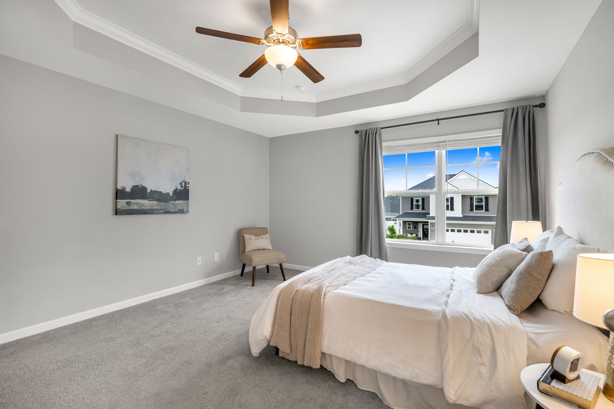 312 Turney Lane Spring Hill, TN 37174 - Photo 32 of 52 a bedroom with a bed and a chandelier