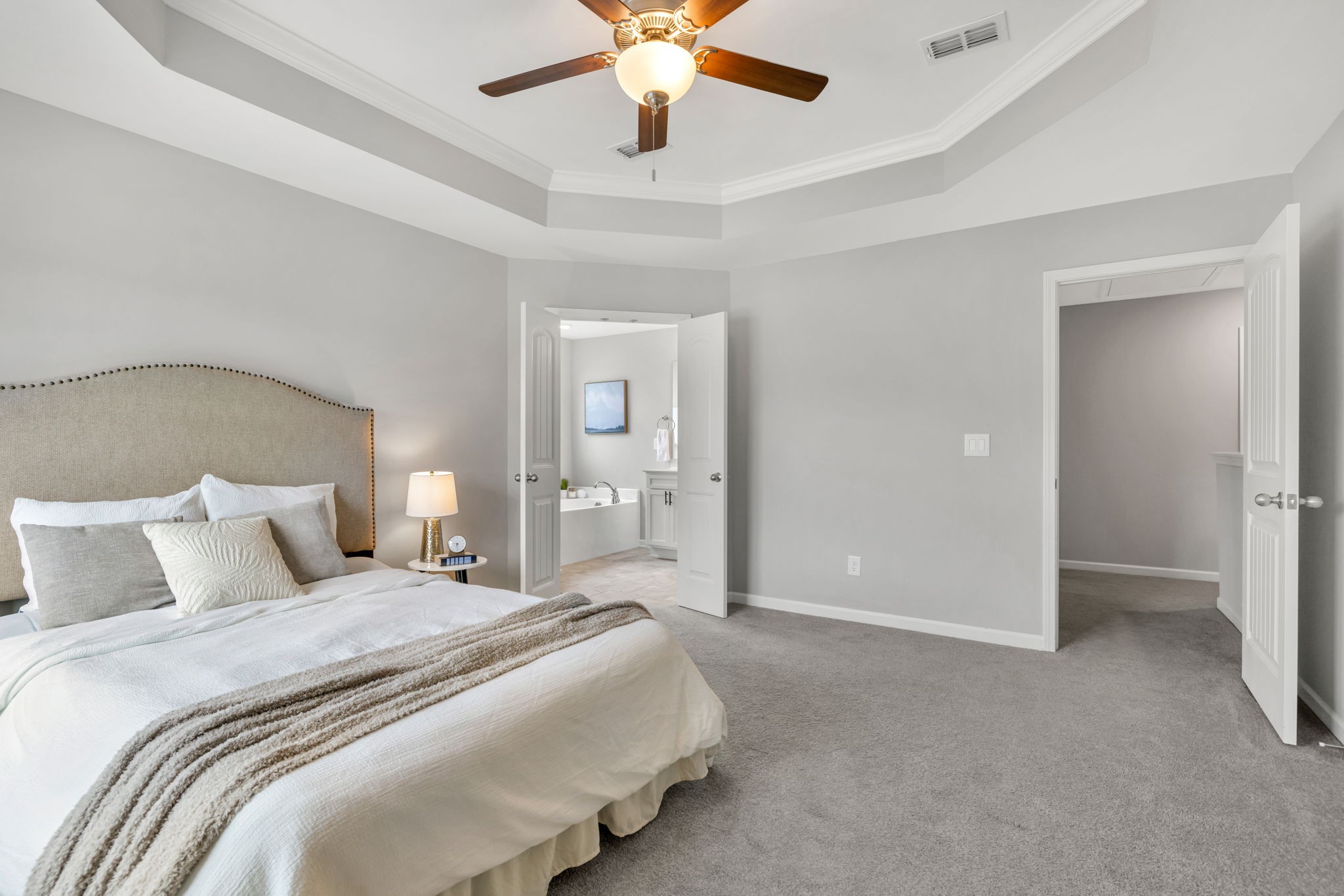 312 Turney Lane Spring Hill, TN 37174 - Photo 34 of 52 a bedroom with a bed and a chandelier