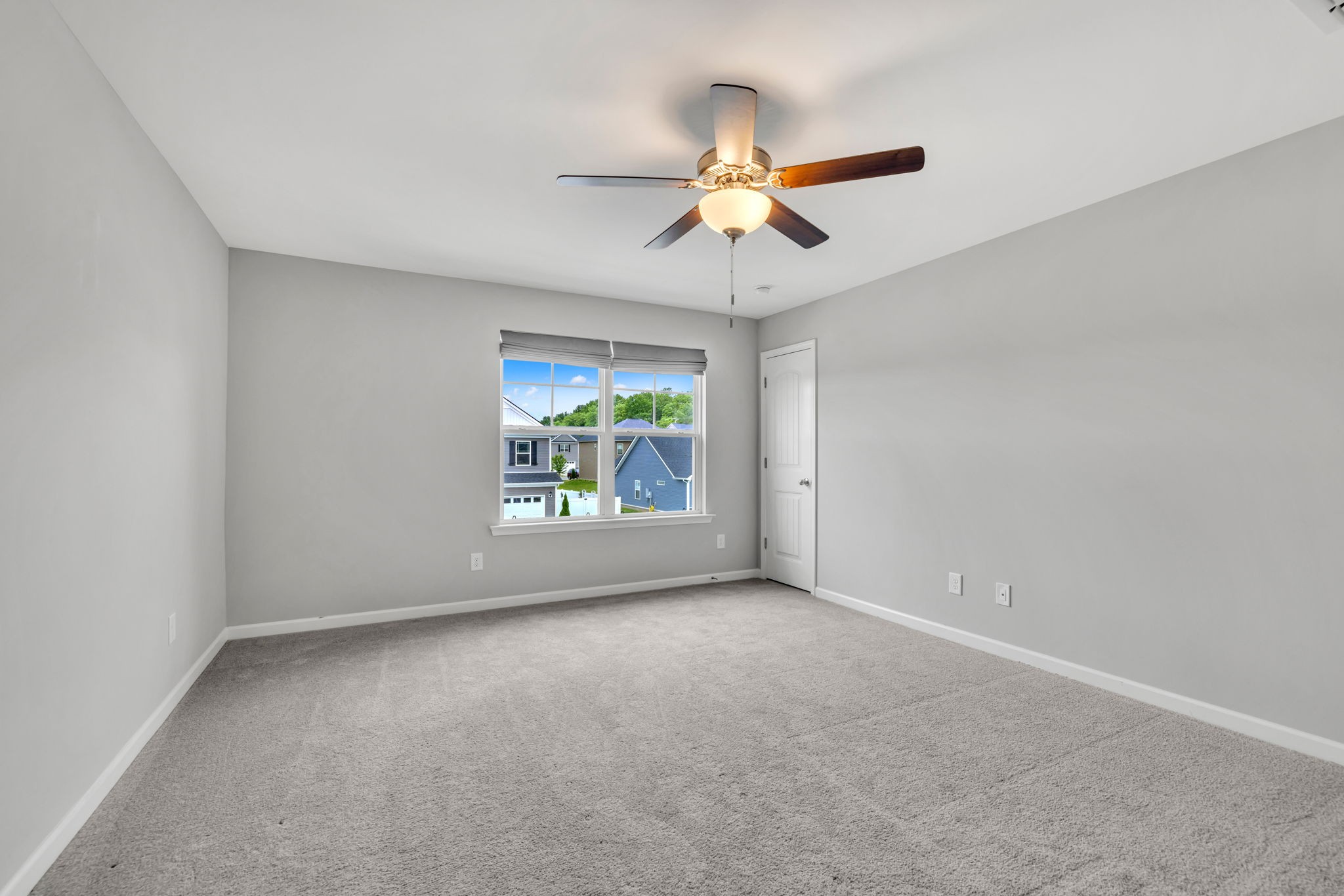 312 Turney Lane Spring Hill, TN 37174 - Photo 42 of 52 an empty room with windows and ceiling fan