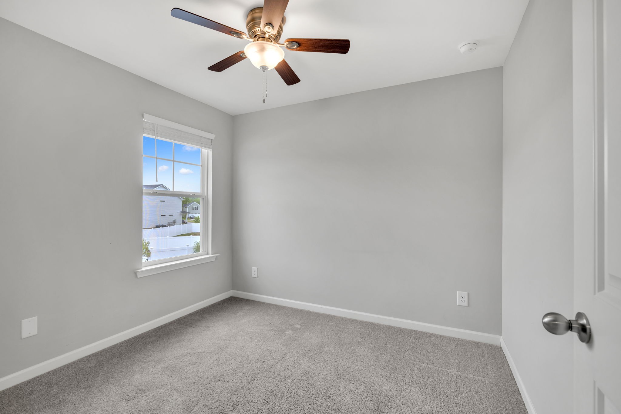 312 Turney Lane Spring Hill, TN 37174 - Photo 45 of 52 an empty room with windows and fan