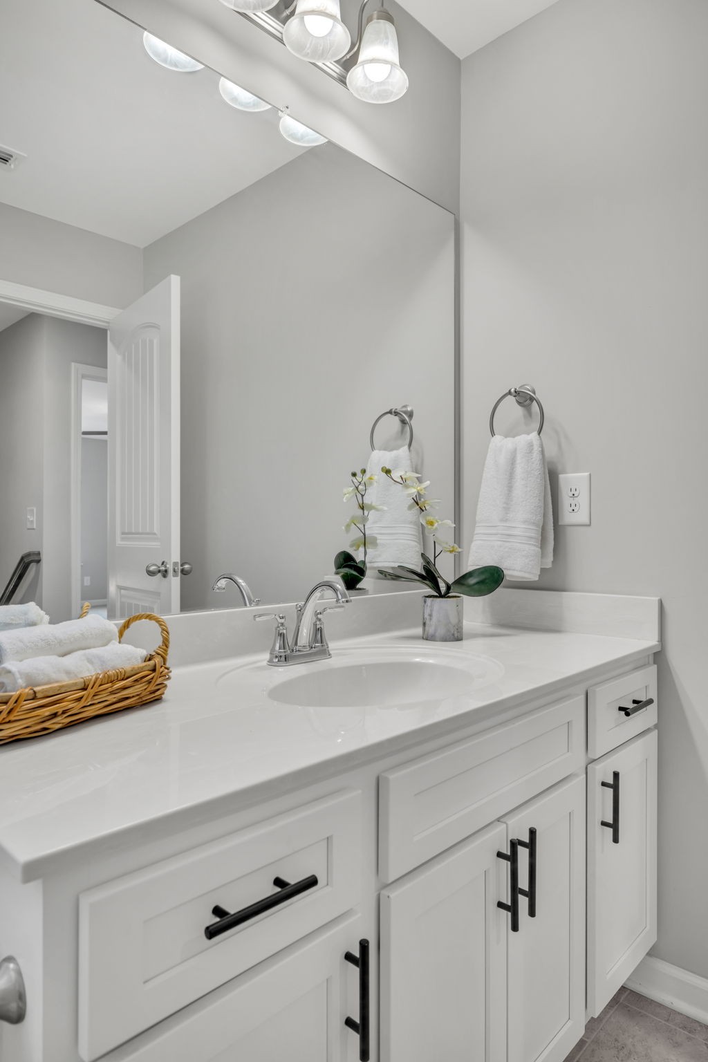 312 Turney Lane Spring Hill, TN 37174 - Photo 47 of 52 a bathroom with a sink and a mirror