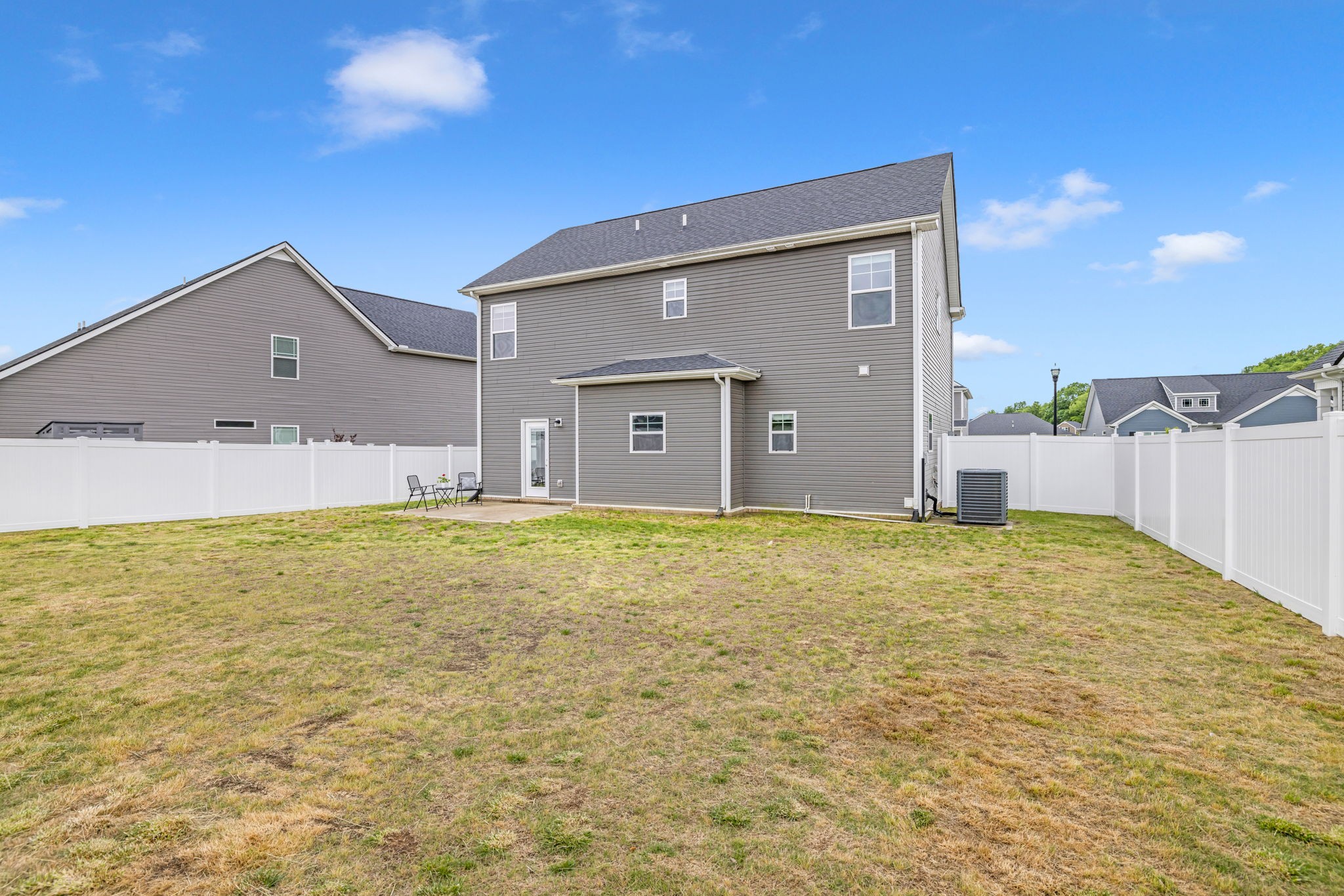 312 Turney Lane Spring Hill, TN 37174 - Photo 51 of 52 a front view of a house with a yard