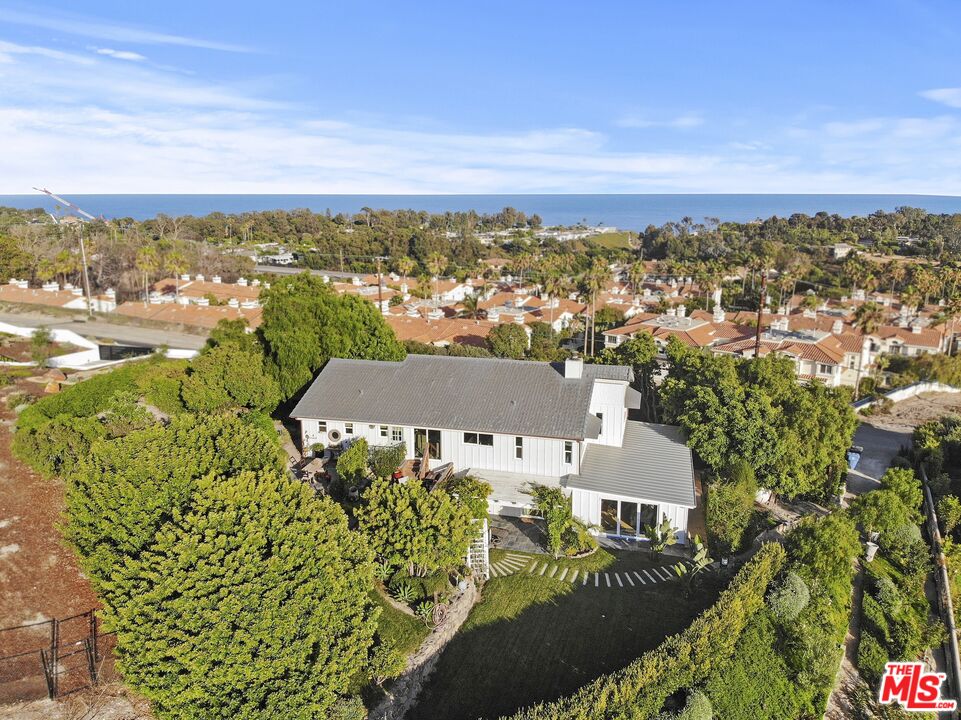 6363 Zumirez Drive Malibu, CA 90265 - Photo 2 of 34 an aerial view of residential houses with outdoor space and trees