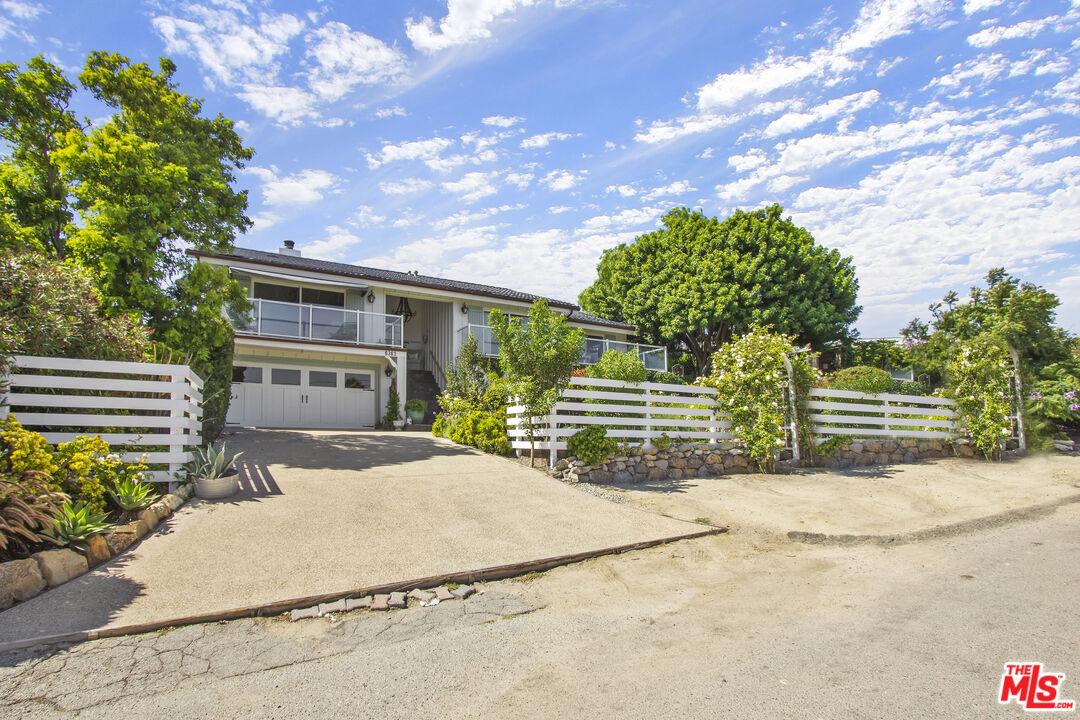 6363 Zumirez Drive Malibu, CA 90265 - Photo 33 of 34 a view of a house with a street