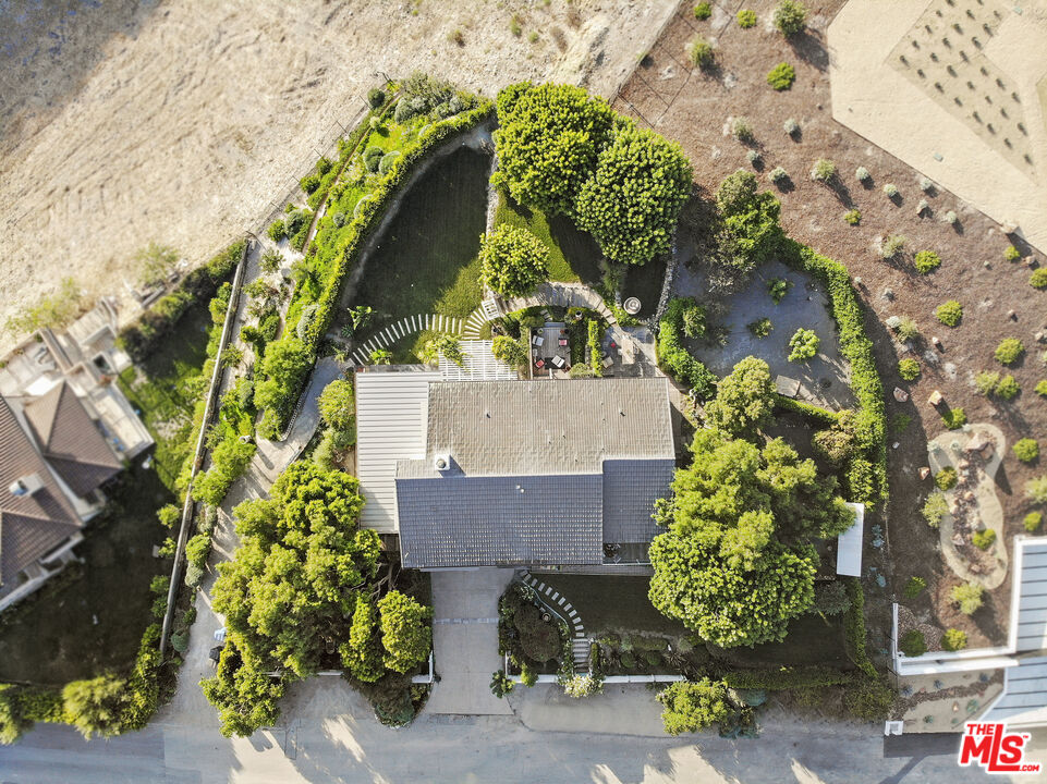 6363 Zumirez Drive Malibu, CA 90265 - Photo 34 of 34 view of a house with a yard