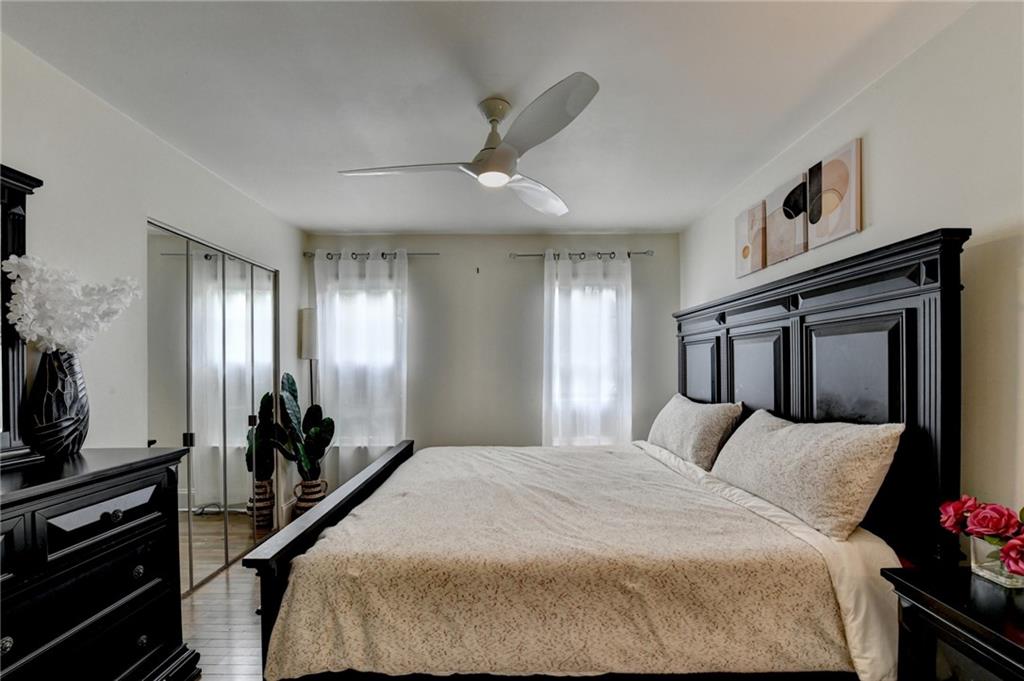 3400 Spring Harbor Drive Doraville, GA 30340 - Photo 22 of 33 a bedroom with a bed and a large mirror on the dresser