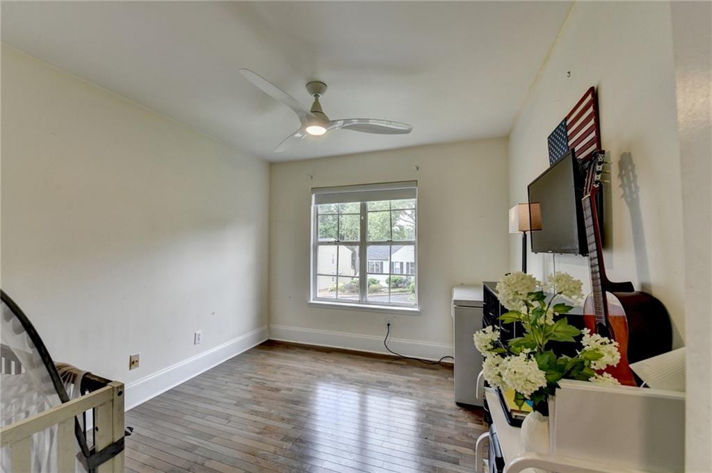 3400 Spring Harbor Drive Doraville, GA 30340 - Photo 24 of 33 a view of a room with wooden floor and a potted plant