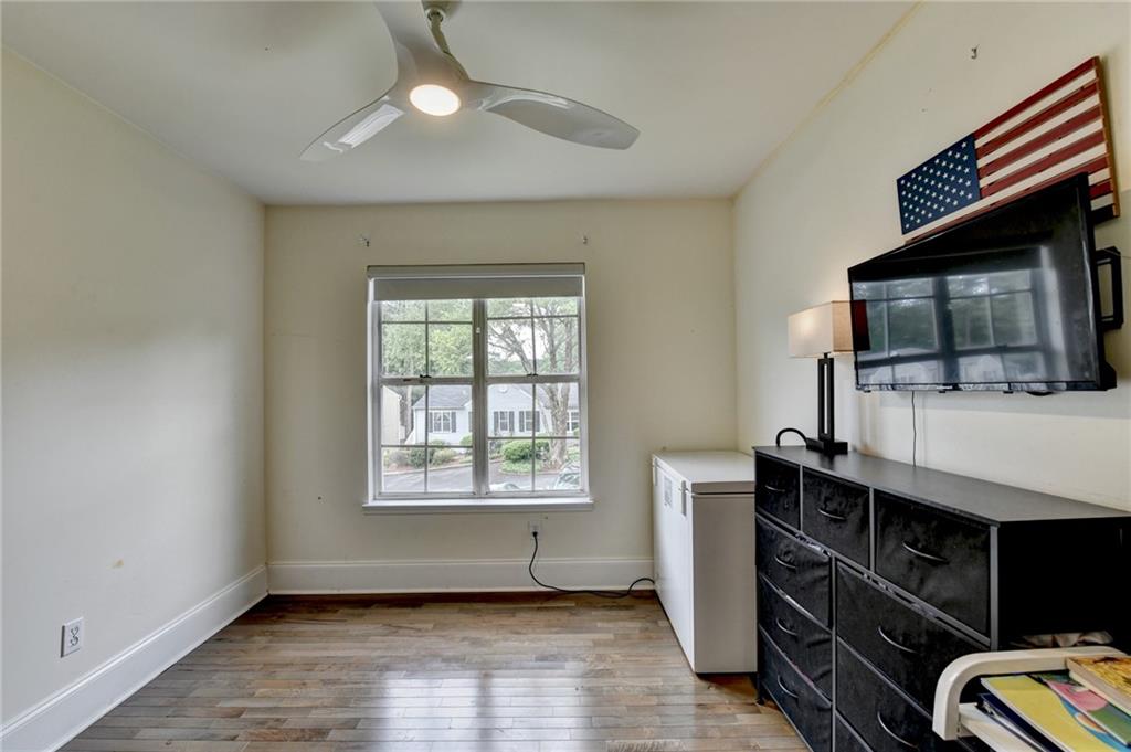3400 Spring Harbor Drive Doraville, GA 30340 - Photo 25 of 33 a view of an empty room with furniture and a window