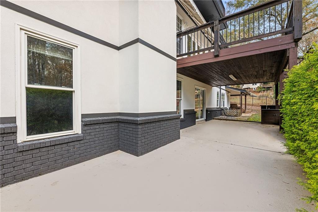 14440 Cogburn Road Alpharetta, GA 30004 - Photo 44 of 62 a view of outdoor space and deck