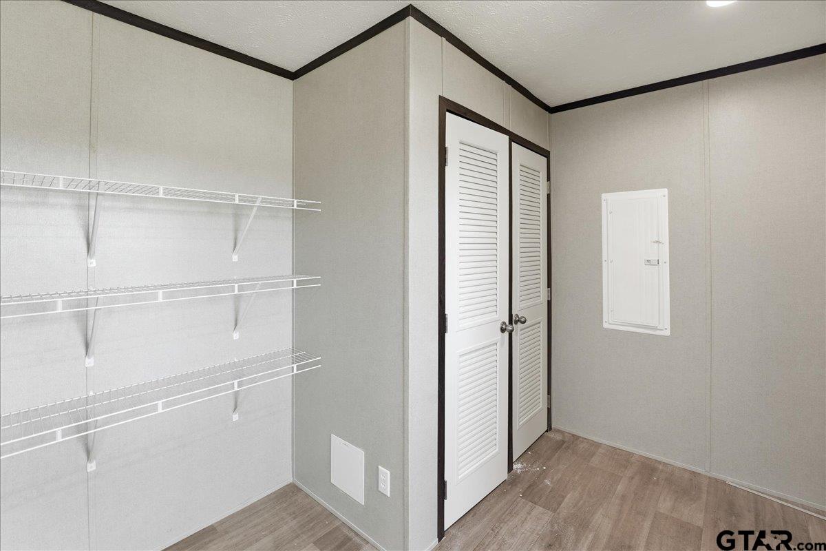 8886 Bayberry Road Gilmer, TX 75645 - Photo 10 of 24 a view of a hallway with closet