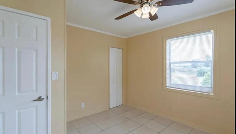 808 West 4th Street Riviera Beach, FL 33404 - Photo 9 of 10 a view of an empty room with a window