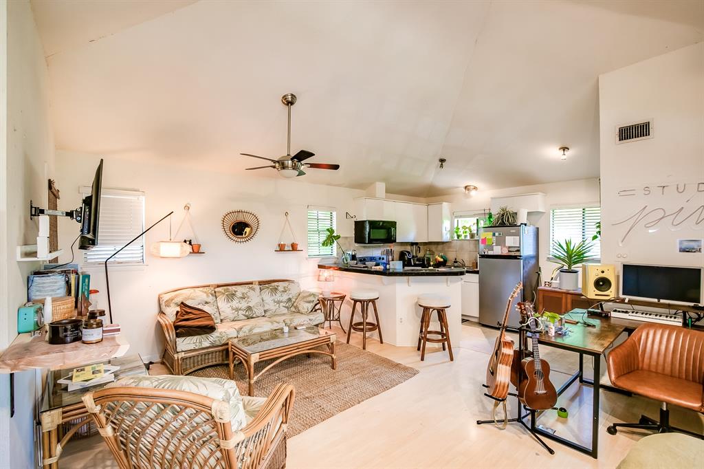 2400 Thornton Road, Unit A Austin, TX 78704 - Photo 3 of 13 Living room featuring ceiling fan