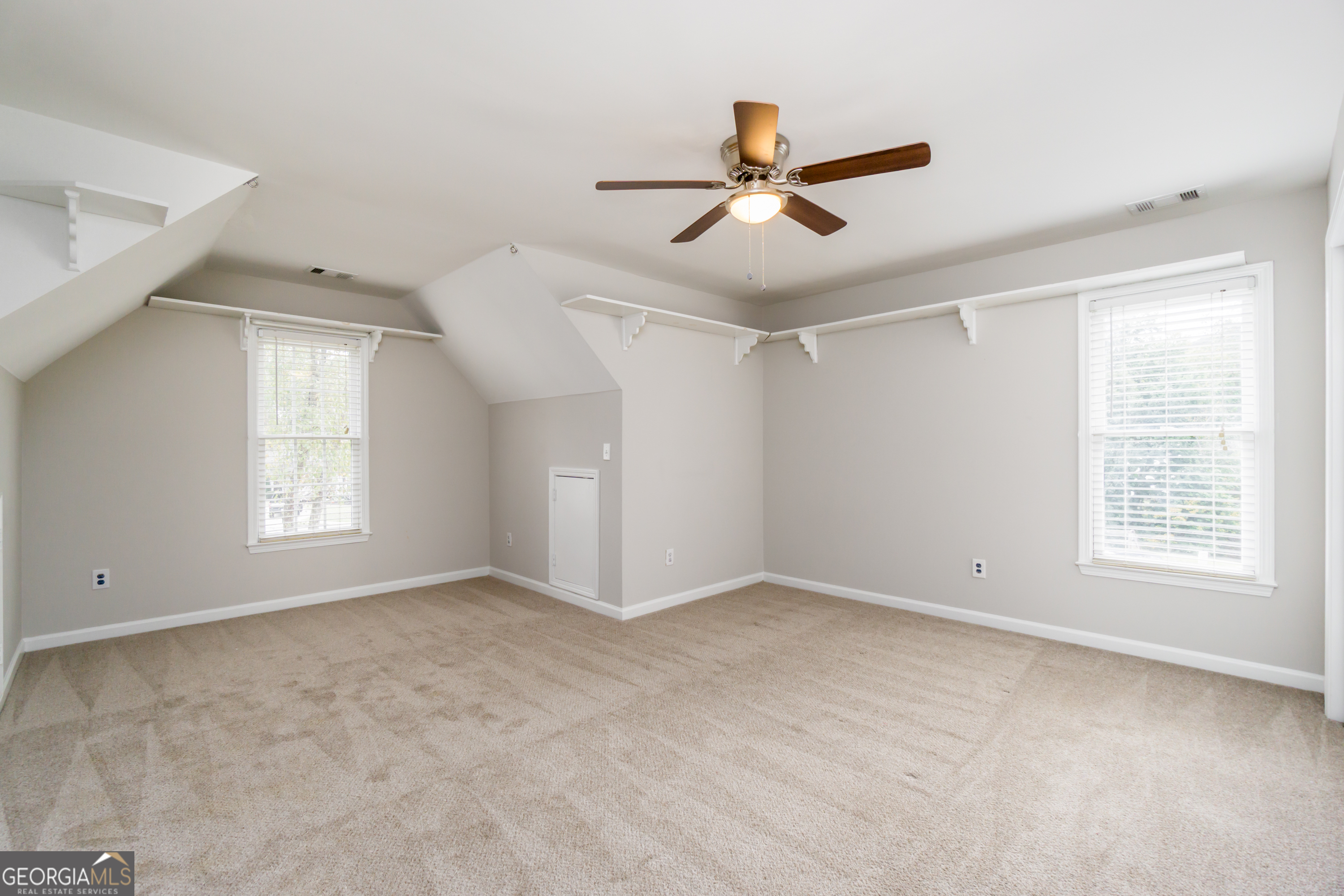 6710 Timber Cove Pointe Cumming, GA 30041 - Photo 33 of 51 a view of an empty room with a window