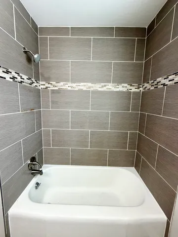 a bathroom with a bathtub