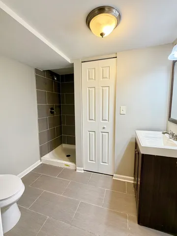 a bathroom with a sink and a toilet