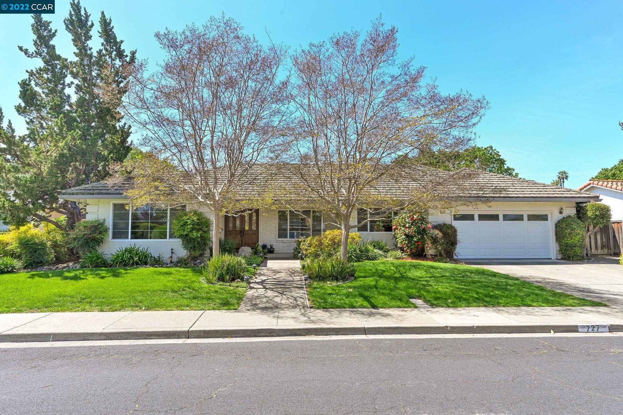 727 Wimbledon Road Walnut Creek, CA 94598 - Photo 1 of 1 a view of a house with a garden and pathway