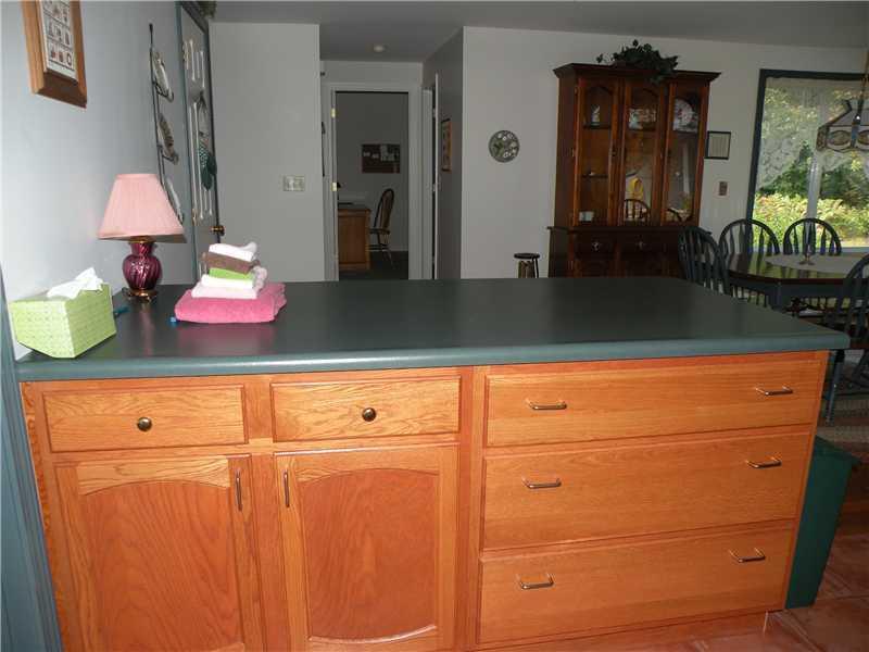 542 Slab City Road Lovell, ME 04051 - Photo 11 of 18 Kitchen. Island with storage and...