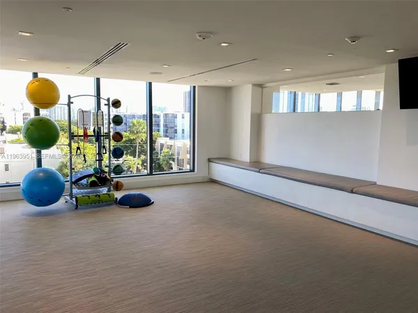 a view of a room with gym equipment