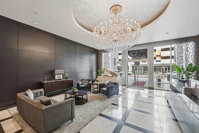 a view of a hallway with an entryway