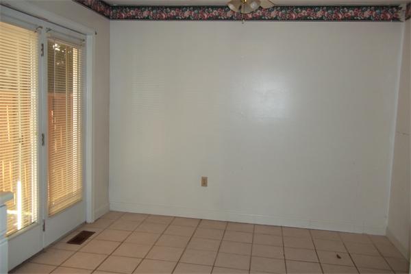 34 Farmland Road, Unit D Lowell, MA 01850 - Photo 3 of 10 a view of an empty room with a window
