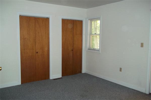 34 Farmland Road, Unit D Lowell, MA 01850 - Photo 5 of 10 an empty room with windows