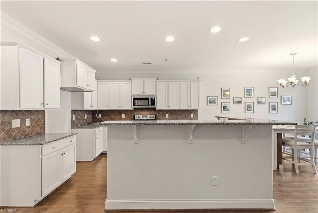 3518 Pebblestone Lane High Point, NC 27265 - Photo 12 of 50 Bar height island