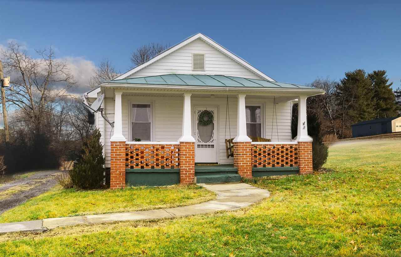 1348 New Hope Road Staunton, VA 24401 - Photo 7 of 47 a front view of a house with a garden