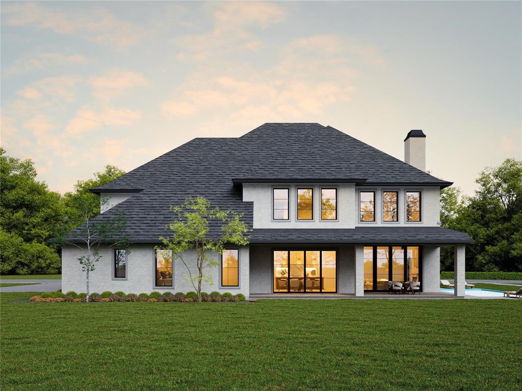 2477 Lonesome Dove Road Southlake, TX 76092 - Photo 3 of 10 a front view of a house with a garden