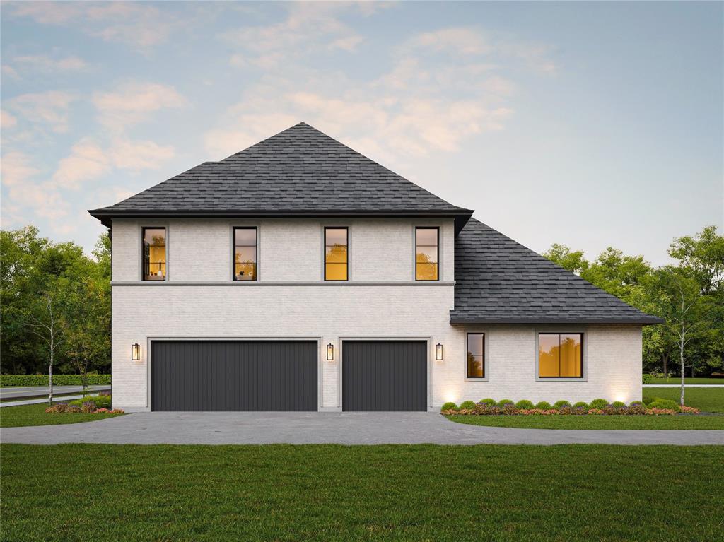 2477 Lonesome Dove Road Southlake, TX 76092 - Photo 5 of 10 a front view of a house with a yard and garage