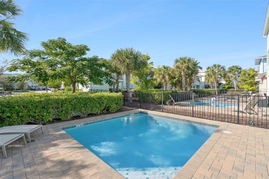 8082 Knee Deep Road Kissimmee, FL 34747 - Photo 2 of 30 a view of a swimming pool with a patio