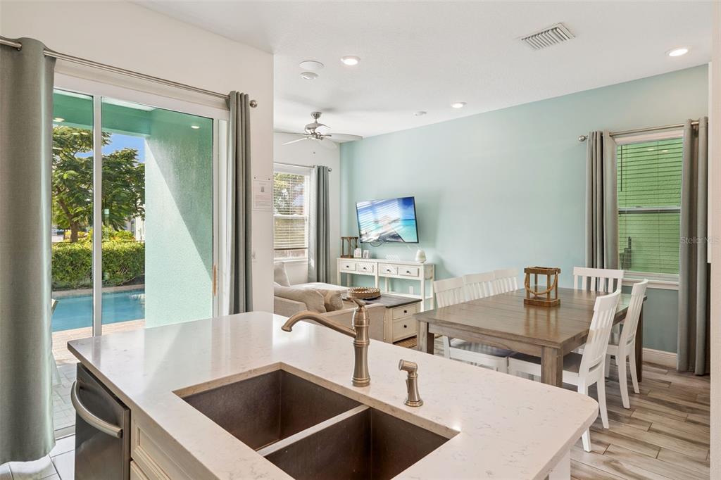 8082 Knee Deep Road Kissimmee, FL 34747 - Photo 7 of 30 a view of a dining room with furniture window and outside view