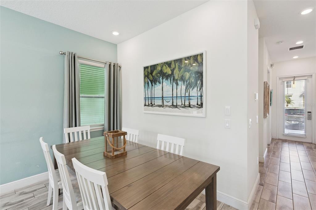 8082 Knee Deep Road Kissimmee, FL 34747 - Photo 8 of 30 a view of a dining room with furniture window and outside view