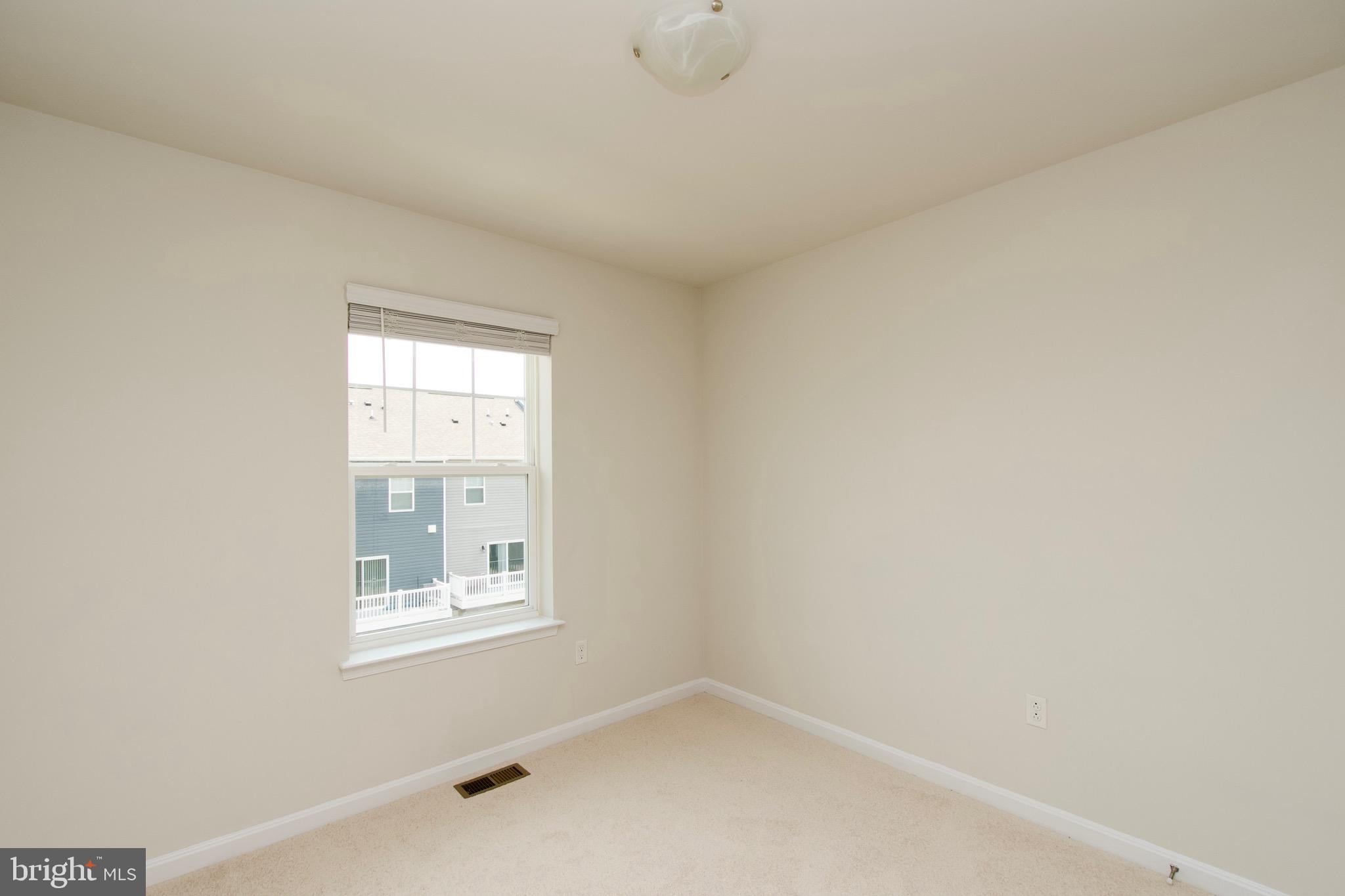 2023 Cross Church Way Bowie, MD 20721 - Photo 18 of 30 a view of an empty room with a window