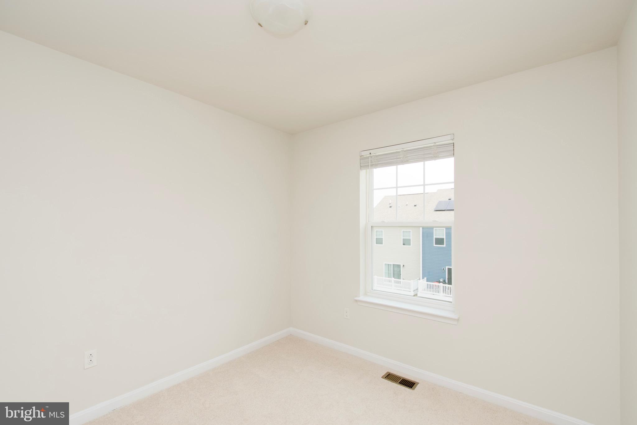 2023 Cross Church Way Bowie, MD 20721 - Photo 20 of 30 a bathroom with a bathtub and a window