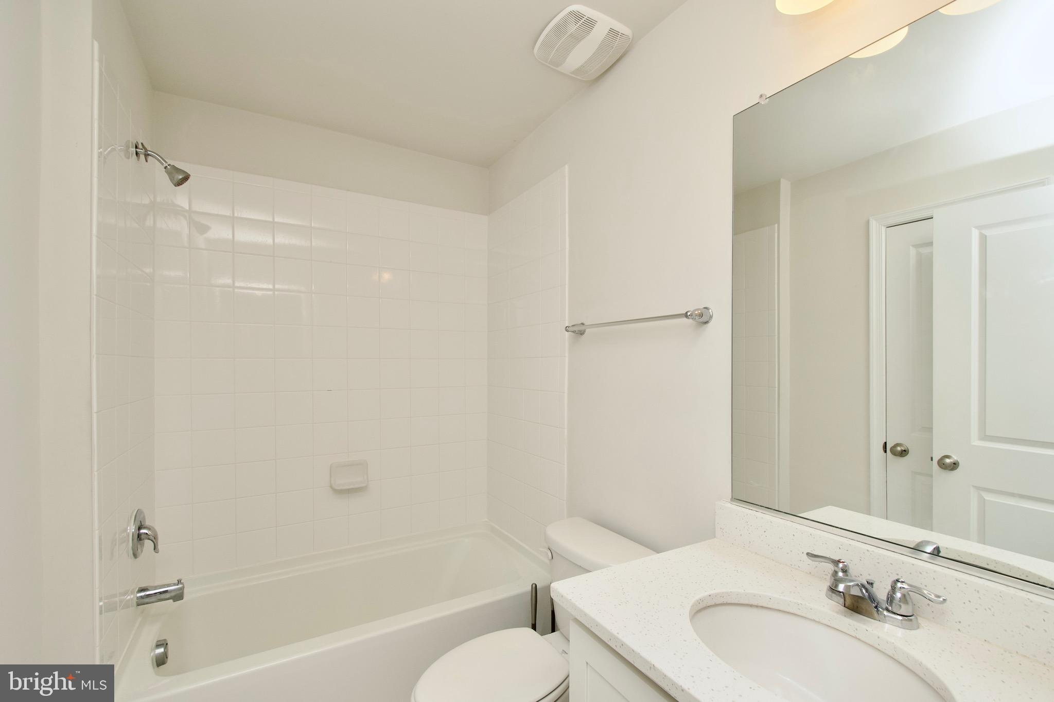 2023 Cross Church Way Bowie, MD 20721 - Photo 22 of 30 a bathroom with a sink toilet and shower